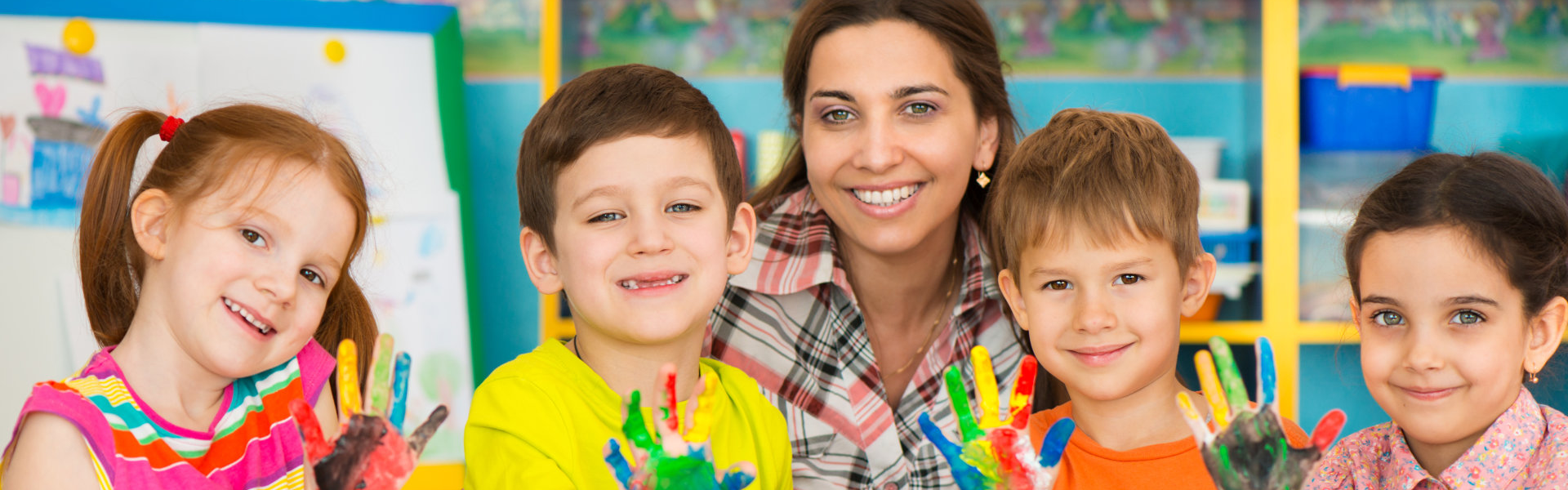 teacher and kids painting